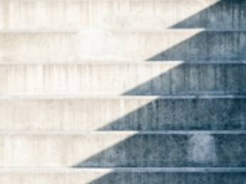 Diagonal shadows across a staircase